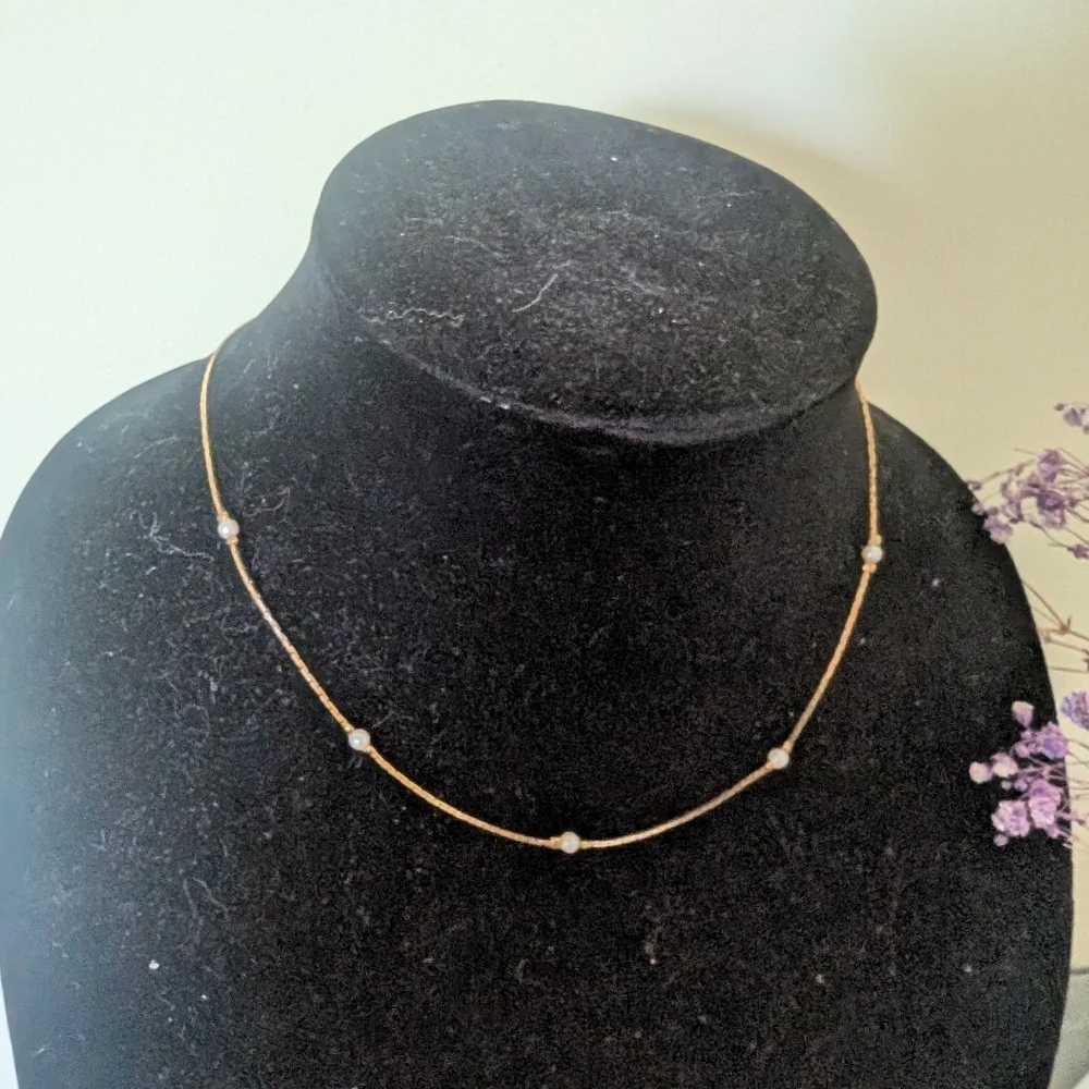 Elegant Gold Necklace with Pearl Accents - Picture 6 of 10